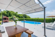 Ferienhaus in Murvica - Holiday house Flora with pool