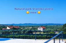 House in Vrana - Holiday Home A&M with pool and lakeview